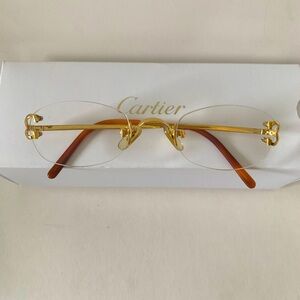 Cartier 22K Gold Plated C Decor Rimless Metal Oval Glasses